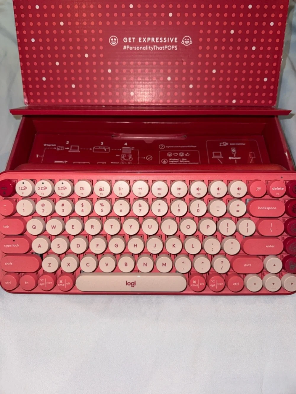 Logitech Retro Round-Key Wireless Keyboard in Red and Pink